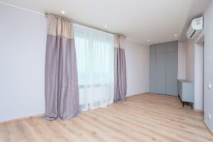 how to cover entire wall with curtains shown in the image