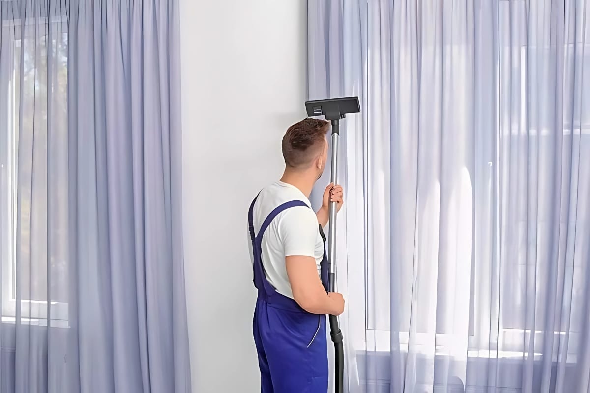 How to Clean Dusty Curtains: A Step-by-Step Guide, featuring a cleaning expert demonstrating effective curtain cleaning techniques.