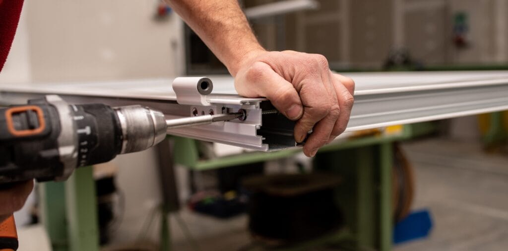 a person fixing roller blind
